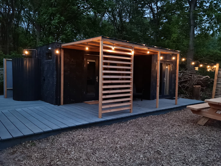 Winst moersleutel Grit Eerste vakantiewoning, gebouwd met gerecycled plastic, geopend op camping  Geversduin - Pretwerk